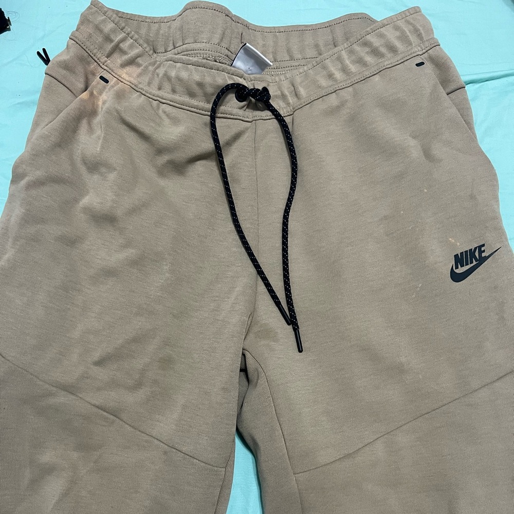 Tan brown Nike tech